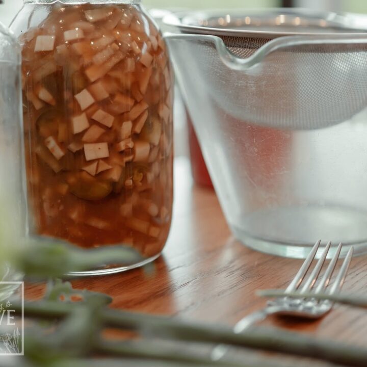 Homemade fire cider macerating and ready for straining